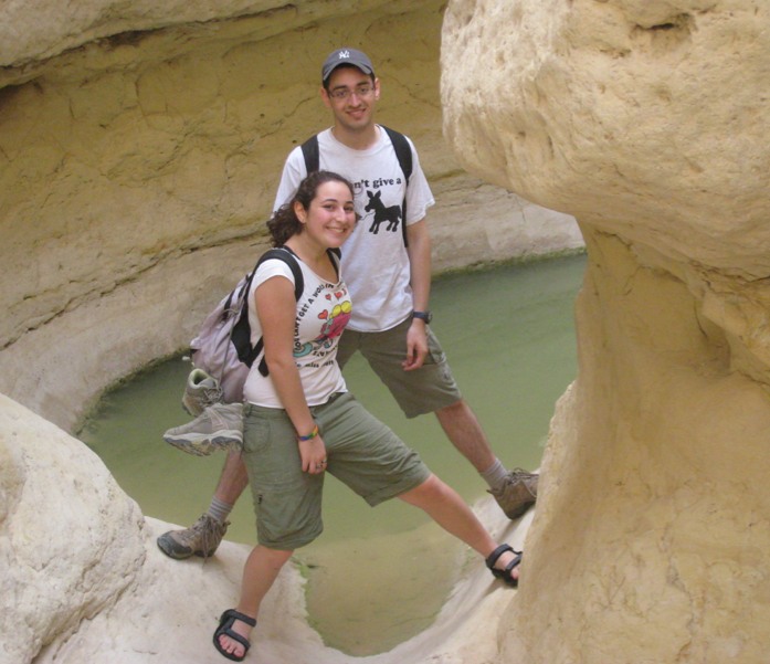 Amir and Merav above pool